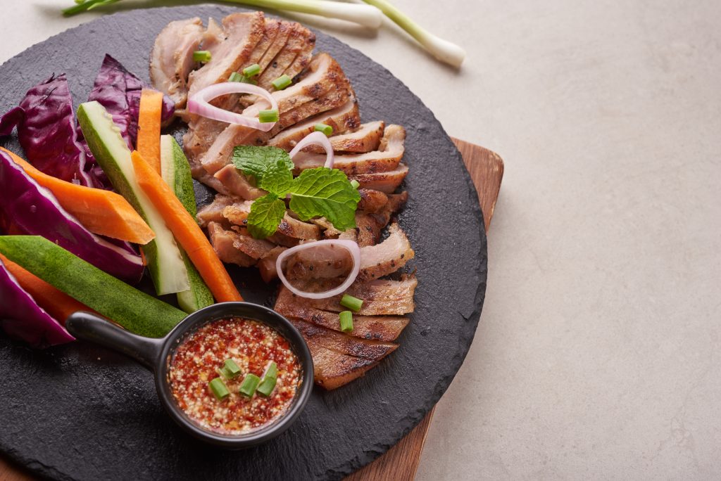 grilled steak with mixed vegetables spices home made tasty food stone surface pork steak with salad grilled pork is one most popular thai dishes grilled pork with spicy dip